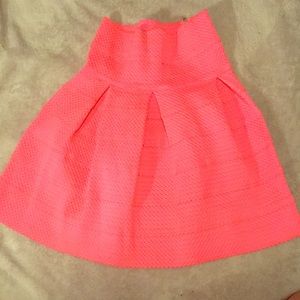 Neon pink Women’s stretchy knee length skirt.